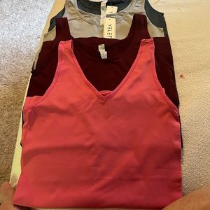 Yelete Fit like a glove tanks. Pink, Maroon, Grey, Denim. Selling as a lot